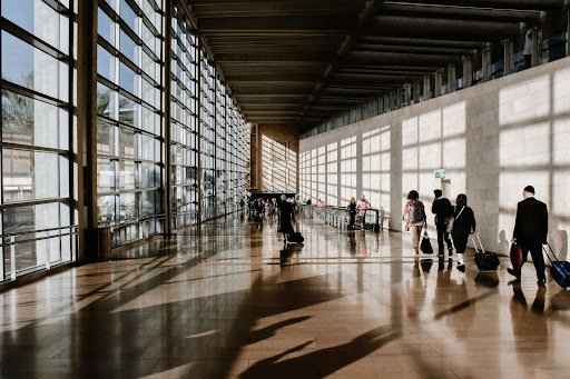 business travelers walking with their luggage